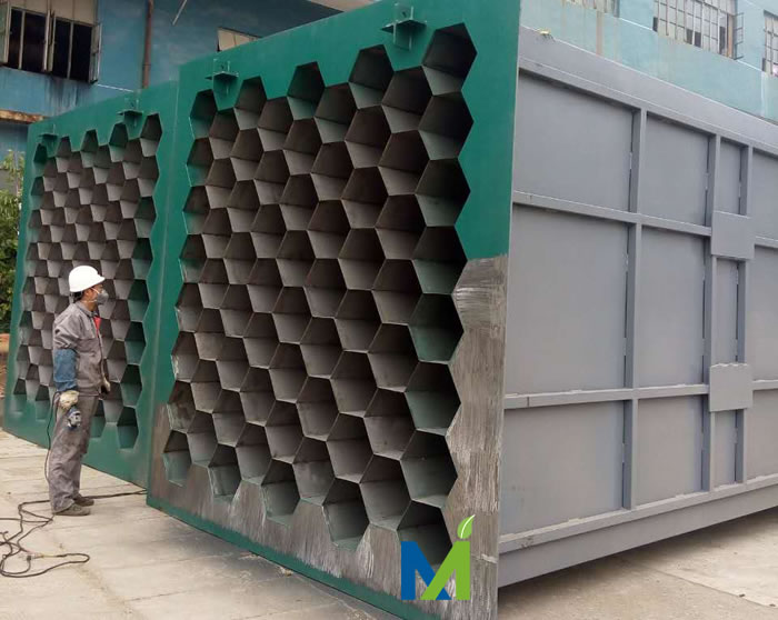 Workers are grinding the stainless-steel anode tubes - alloy-steel anode tubes before installation Completed stainless-steel wet electrostatic precipitators